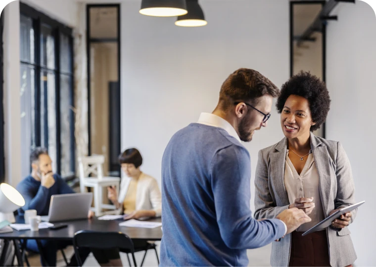 Team members engaged in conversation