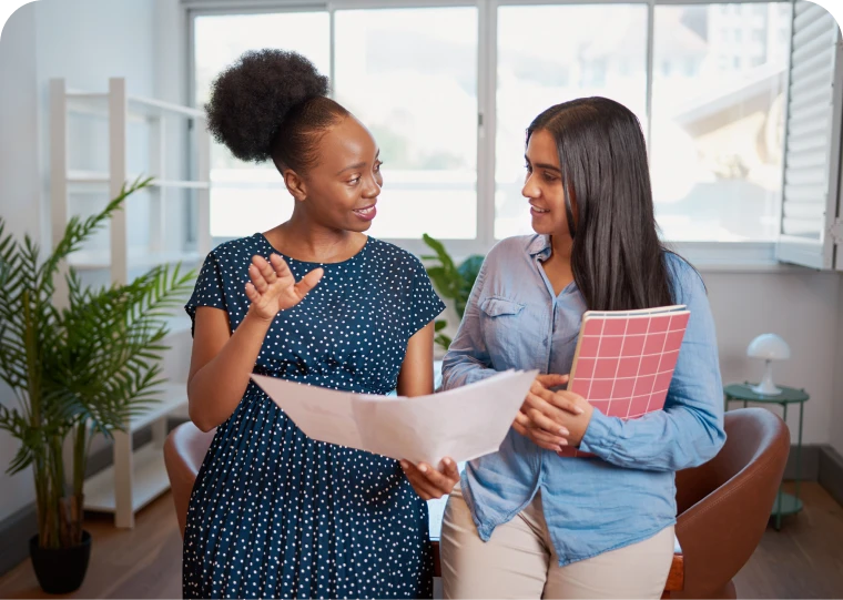Colleagues collaborating in office setting