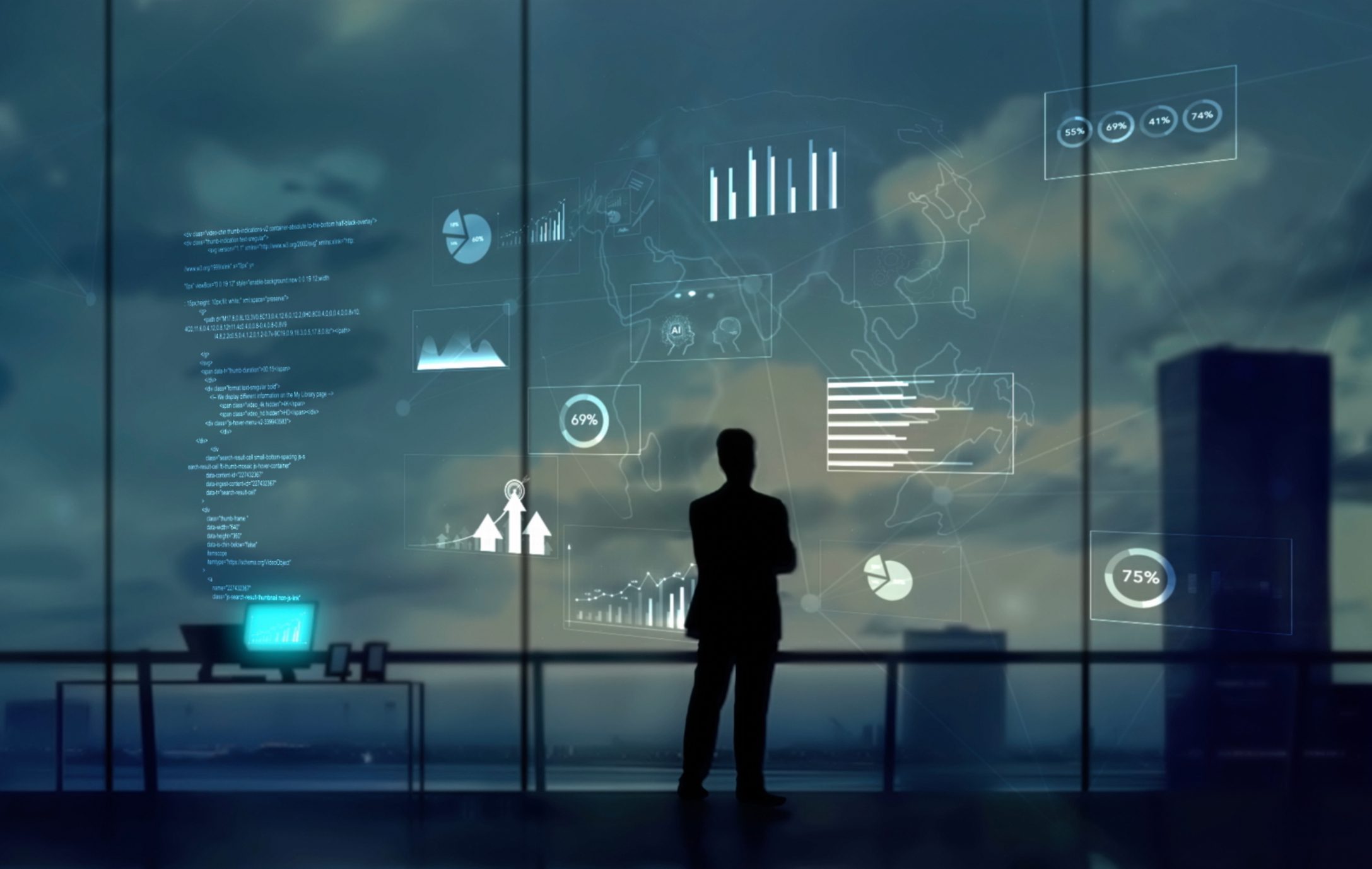 Silhouette observing futuristic digital data display.